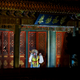 In this Tuesday, Feb. 19, 2019, photo, a Peking Opera artist performs in the Forbidden City which lit up by lights for the Lantern Festival in Beijing. China lit up the Forbidden City on Tuesday night, marking the end of 15 days of lunar new year celebrations. It was not a Lantern Festival the last emperor, who abdicated in 1912, would have recognized. There were lanterns, but those lucky enough to snag tickets saw a laser light show and historic buildings bathed in colorful lights. Others watched from outside the vast walled compound in Beijing, from where Ming and Qing dynasty emperors ruled for five centuries. (AP Photo/Andy Wong)